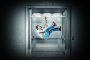 Man falling in elevator