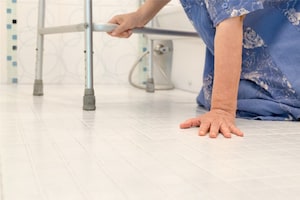 Person holding to a walker