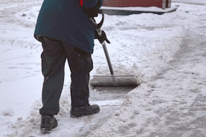 Person removing snow