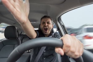 Person Screaming At The Wheel