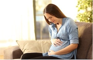 Pregnant Woman Suffering by Belly Ache