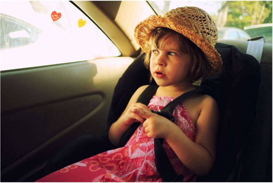 A young child in a car seat
