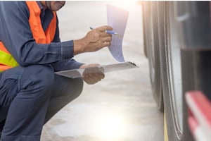 Man checking wheels